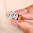 Emerald cut moissanite men's ring bezel style.
