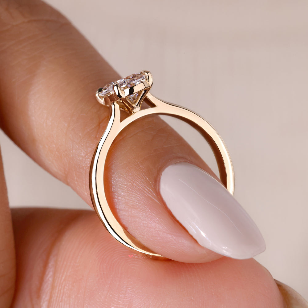 Solitaire setting ring featuring a lab grown diamond for a sustainable and ethical choice in fine jewelry.
