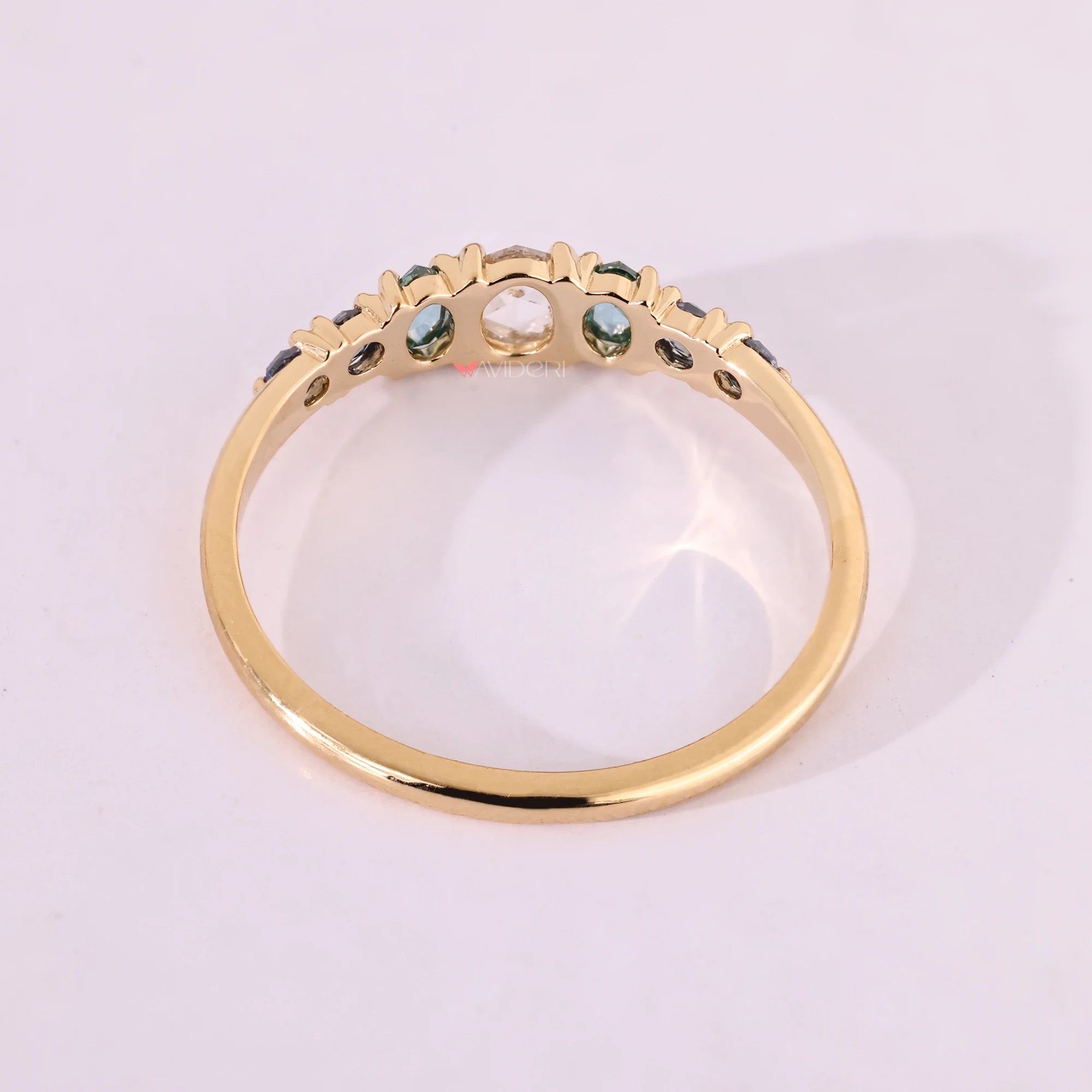 Yellow gold wedding band with moissanite wedding band style.