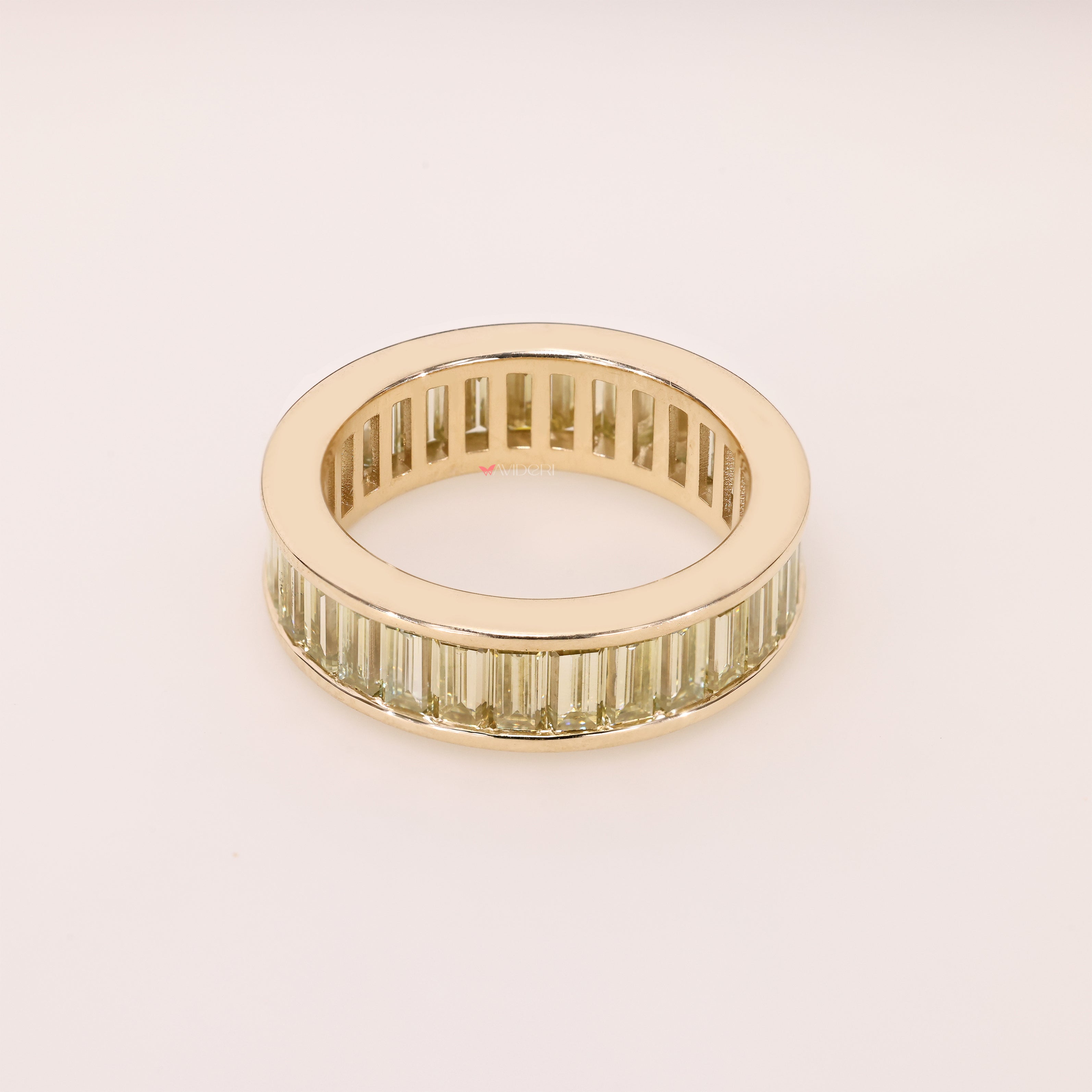 Handmade channel setting eternity band style.
